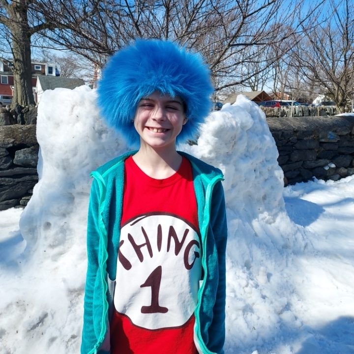 Thing 1 enjoys herself in front of the Seussical Snow Fort.